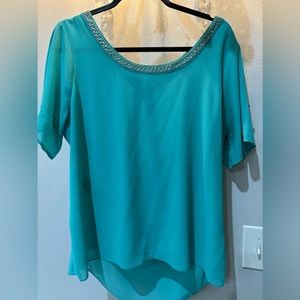 Green top unknown brand but beautiful used. Item number 152